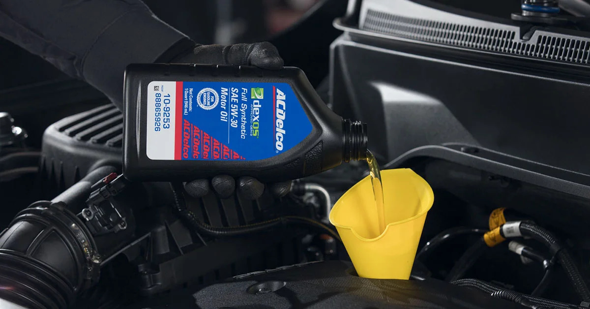 Oil being poured into engine